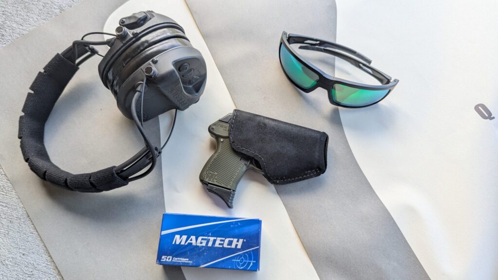 GBUW qualification gear: Safariland Liberator hearing protection, KelTeck P32 pocket pistol in Safariland Model 25 pocket holster, ballistic sunglasses, and a box of Magtech ammo