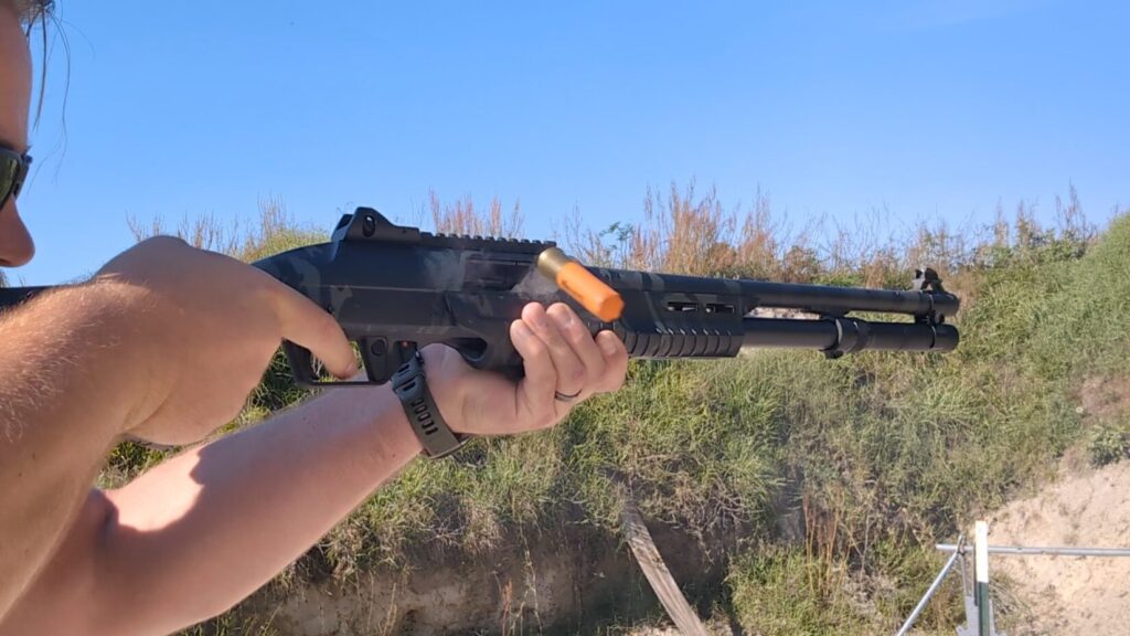 Shell ejecting from shotgun