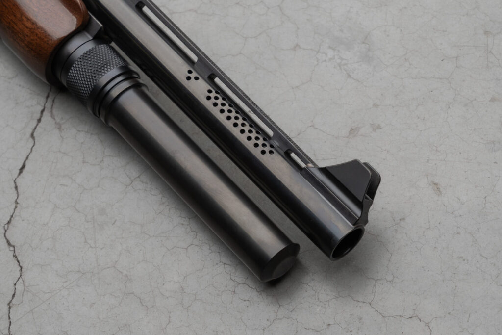 Shotgun porting done by Vang Comp on barrel that improves the grouping of both buckshot and birdshot.
