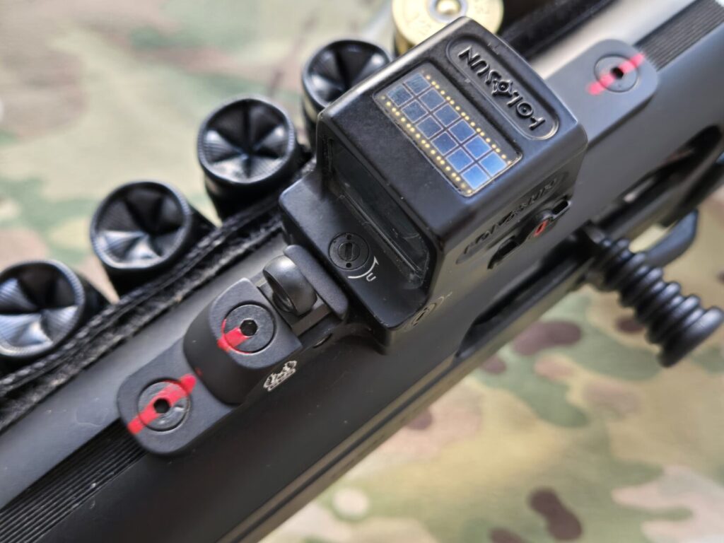 Witness marks on a 12 ga shotgun to ensure screws aren't walking out.