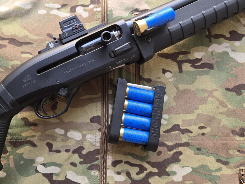 Beretta 1301 with spare ammo. Ammunition for a shotgun can be carried in a side saddle, round saver, shotshell cards, and other dedicated holders.