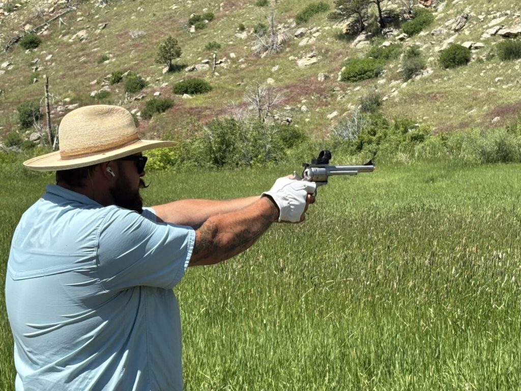 Free hand shooting a big bore revolver at HHC.
