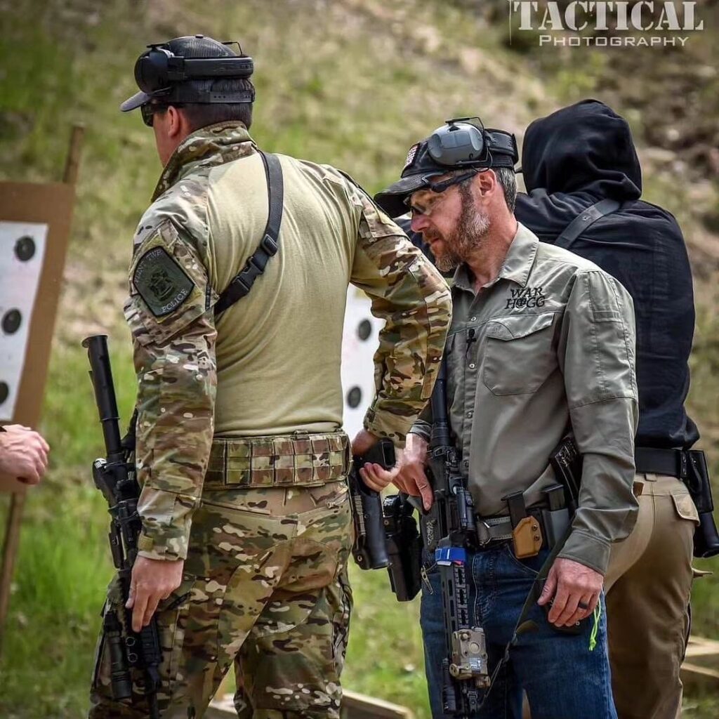 Rick Hogg of War HOGG Tactical training with a law enforcement officer on transitioning from a carbine to pistol