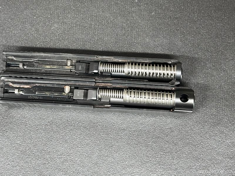 Glock slides, side by side.