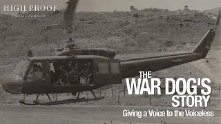 Pictures is a Huey helicopter with a k9 handler and his k9 heading into combat