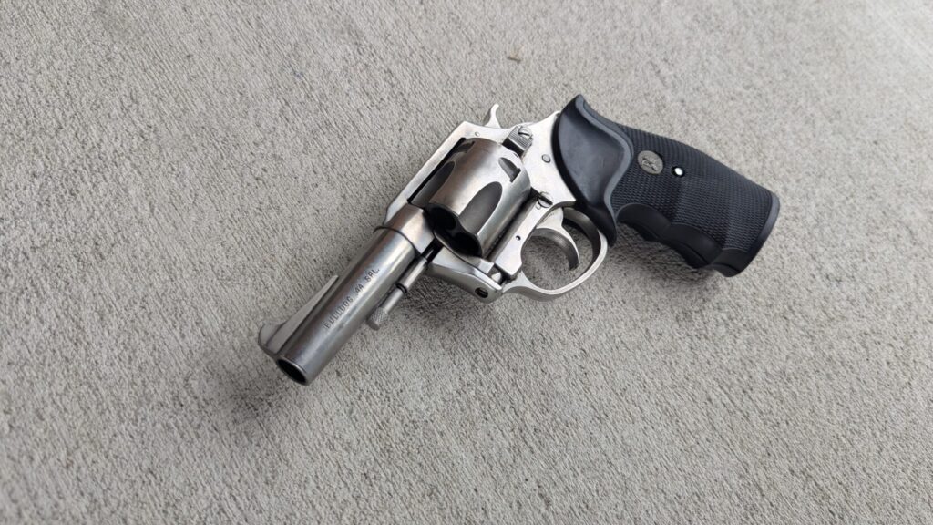 Stainless bulldog revolver on concrete