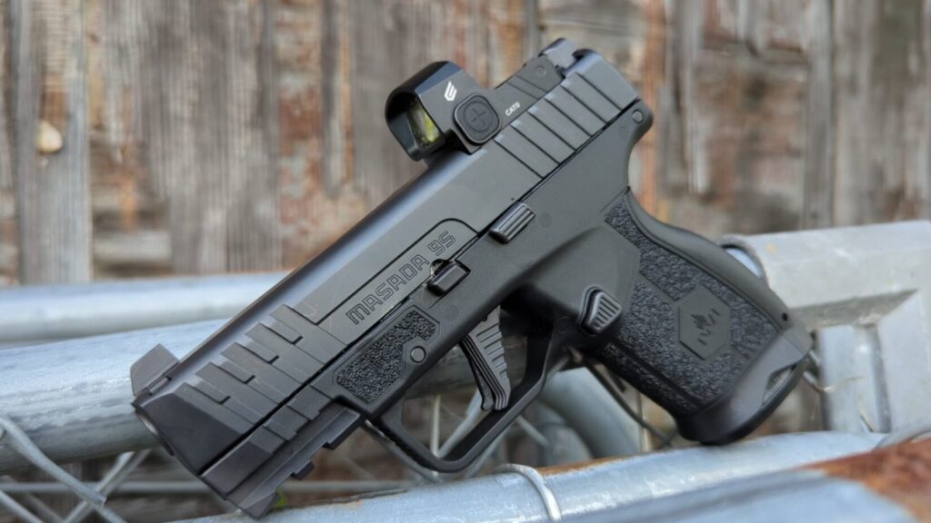 Masada slim elite profile outdoors on fence
