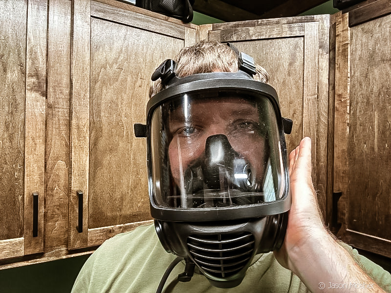man wearing gas mask