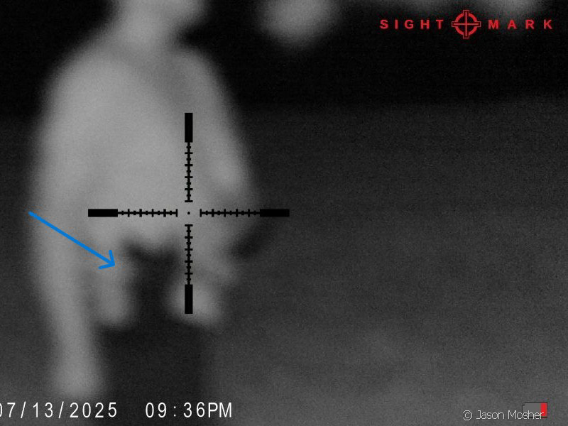Night vision view of a Safariland holster attached to belt on a man, 50 yards out