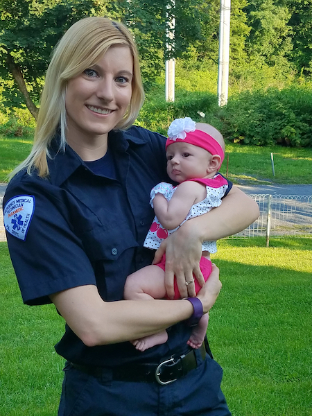 Dani Kamenar holding her daughter Brooklyn