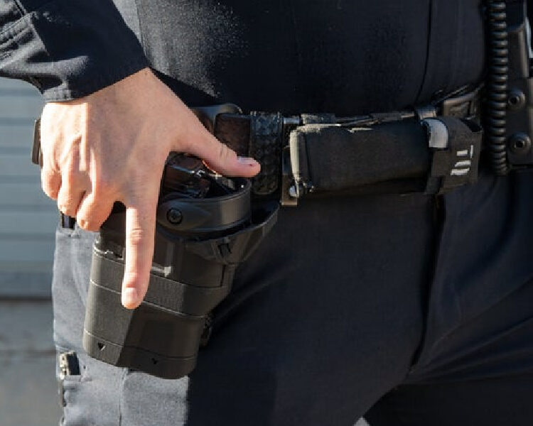 safariland ballast, level 3 retention holster, on belt of an officer