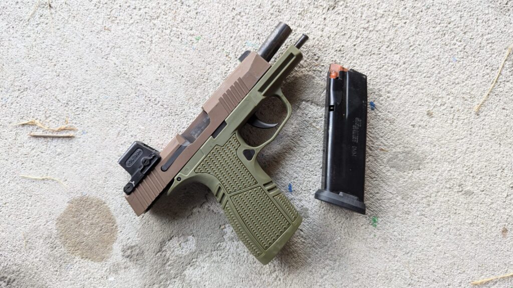 Green/tan pistol (slide locked)