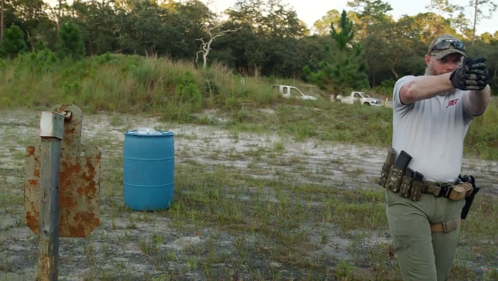 man performing dry fire drill at outdoor range
