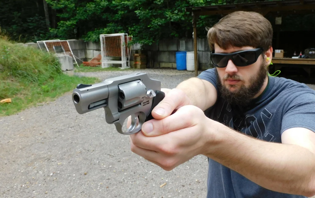Man holding a revolver