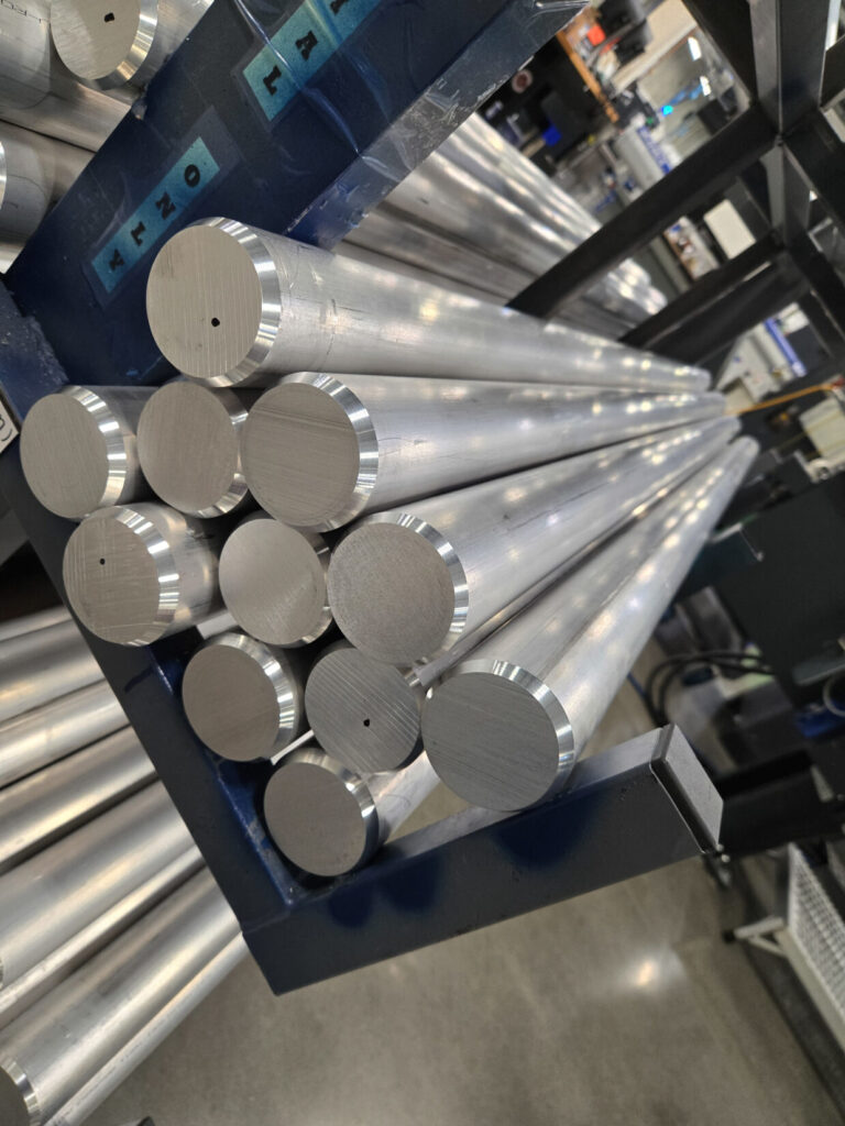 multiple racks of high-quality aluminum barstock