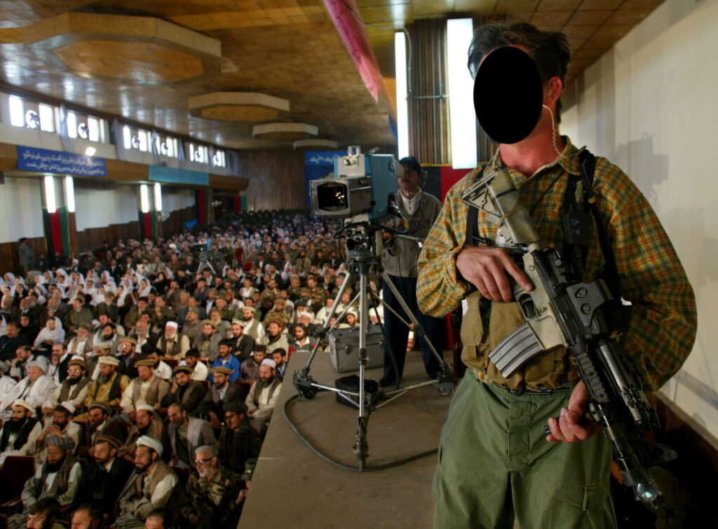 DEVGRU operator watching the crowd during a public appearance of Afghan President Hamid Karzai. (U.S. Navy photo. Public Domain)