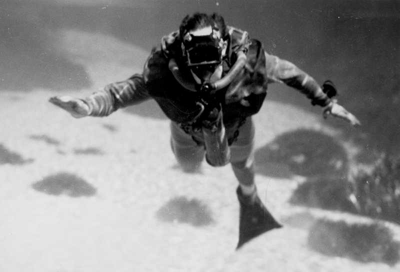 Dr. Christian Lambertsen, swimming underwater with a LARU. (Photo courtesy CIA. Public Domain)