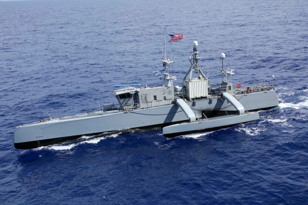 Sea Hunter – Autonomous Surface Vessel, A sleek, unmanned ship developed by DARPA and the U.S. Navy, representing the future of autonomous maritime operations.  (U.S. Navy photo by Mass Communication Specialist 3rd Class Aleksandr Freutel. Public Domain)