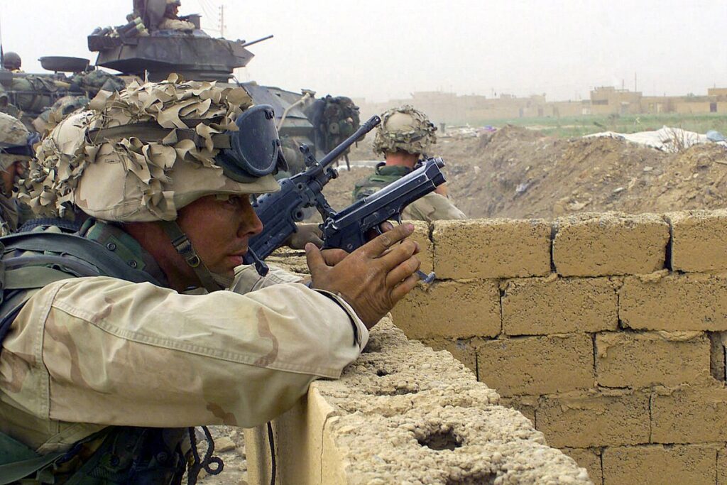 a US Marine holds an M9 pistol