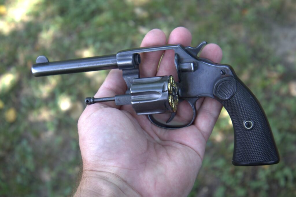 colt new police revolver with cylinder in the open position