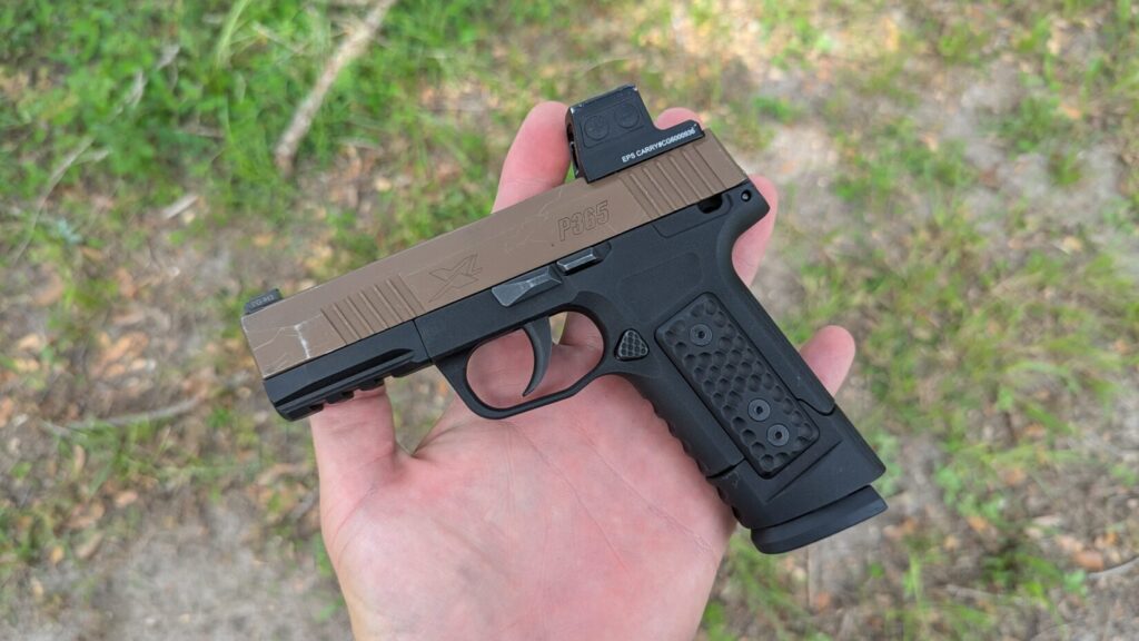 S365 grip with P365 slide and optic in hand.