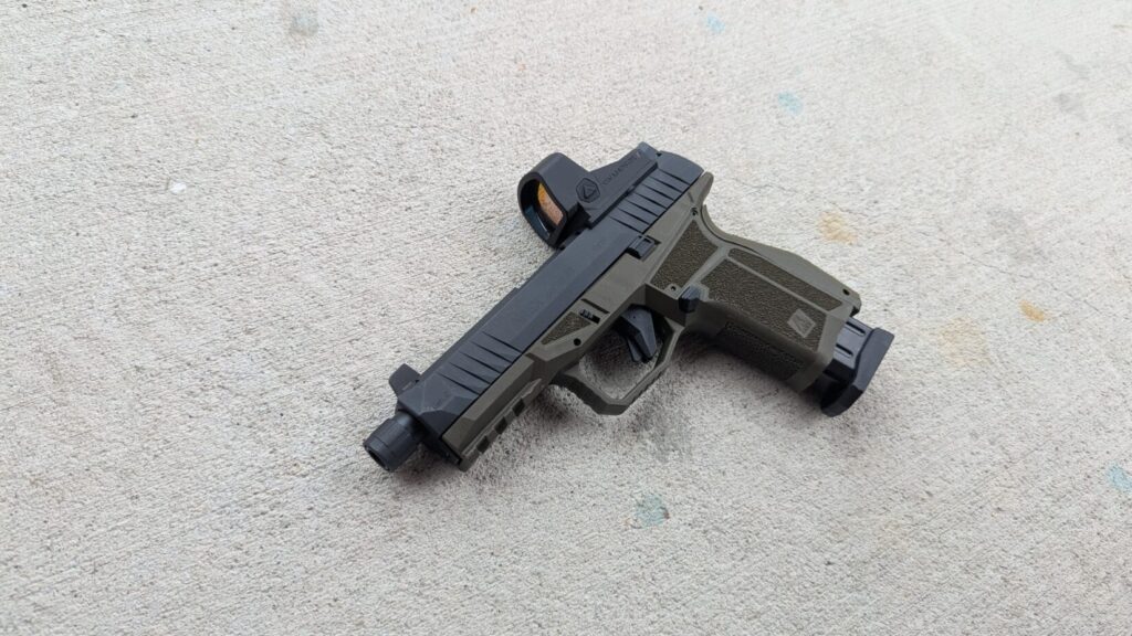 A close-up of the Swampfox Justice 2 optic mounted on the Arex Delta Gen 2 pistol.
