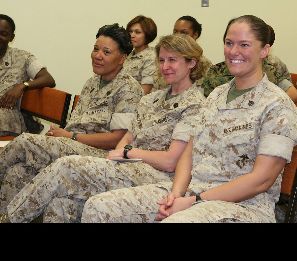 United in Honor: Marines gather at Marine Corps Base Camp Lejeune in solemn tribute to the legacy, courage, and enduring contributions of women who have shaped the Corps with strength and distinction. The three women pictured spoke at the service, sharing their experiences about being female Marines. (U.S. Marine Corps photo by Cpl. Melissa Latty. Public Domain)