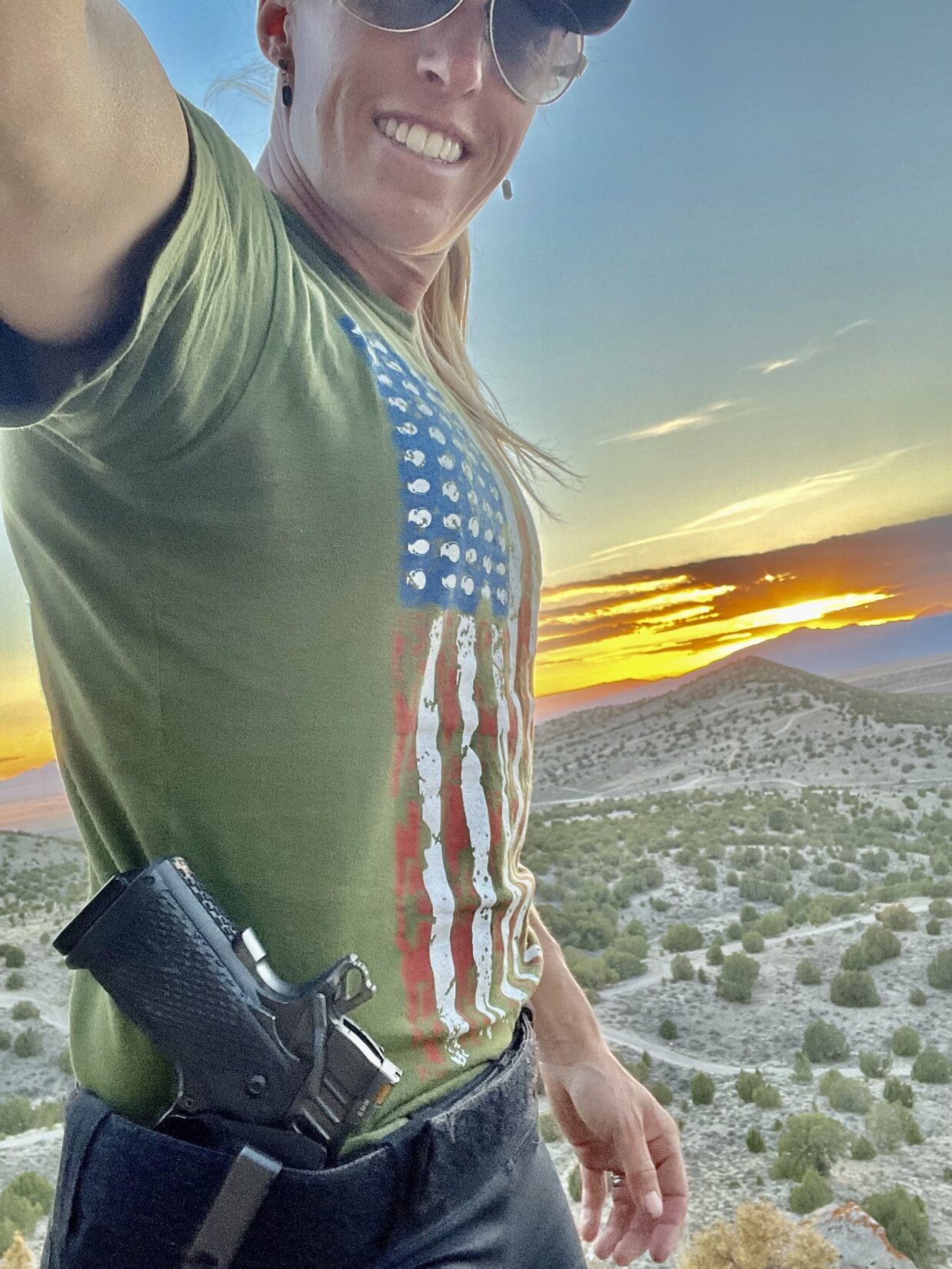 Lanny Barnes selfie with Staccato handgun holstered IWB