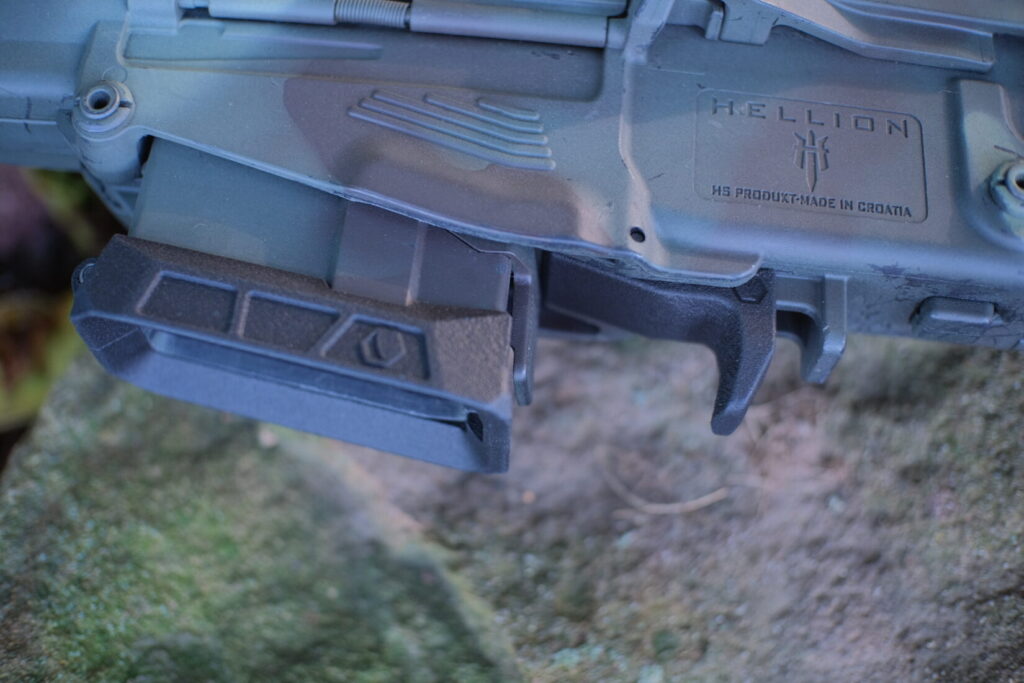 Closeup side view of the Lunartech Designs enhanced mag well and enhanced bolt catch release lever.