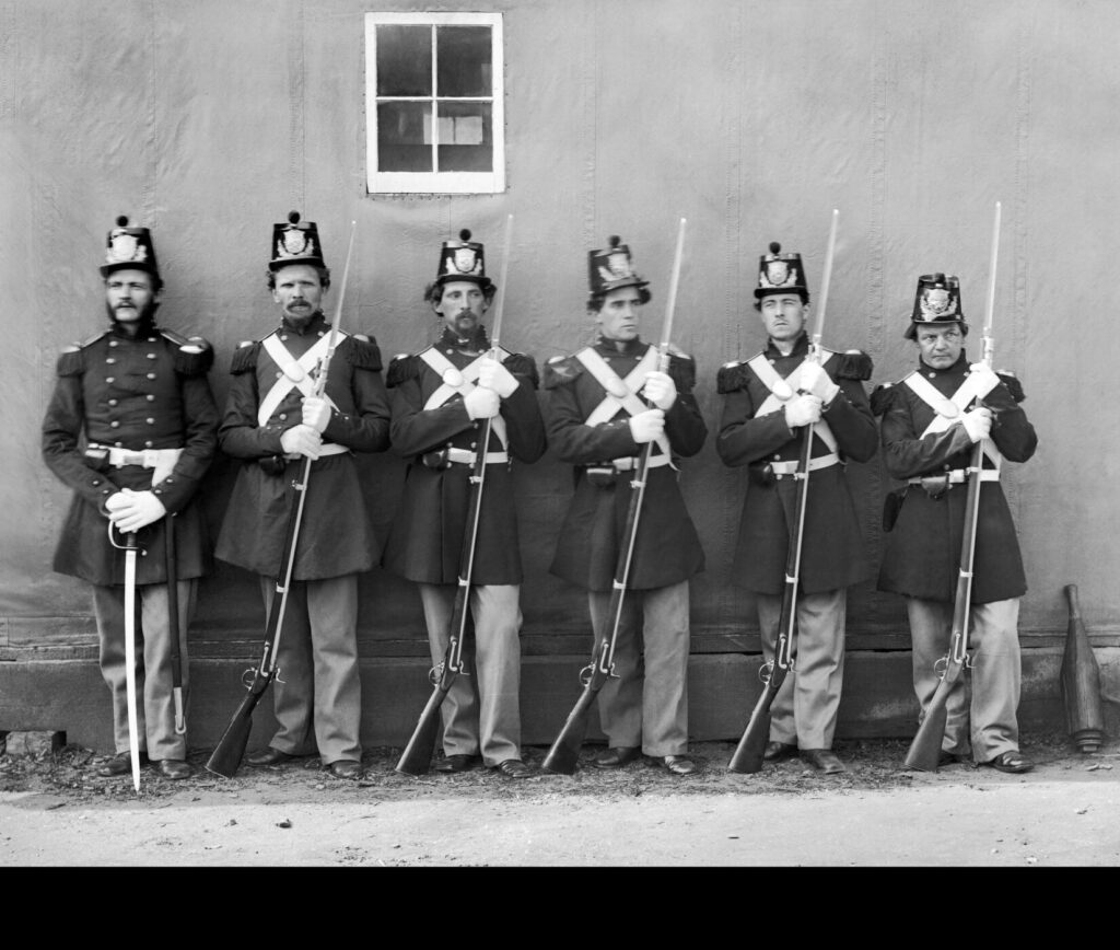 
Pictured by an unknown photographer, five U.S. Marine Corps privates with fixed bayonets under the command of their noncommissioned officer (NCO), who displays his M1859 Marine NCO sword. Navy Yard, Washington, DC, April 1864. (Library of Congress Prints and Photographs Division. Public Domain)