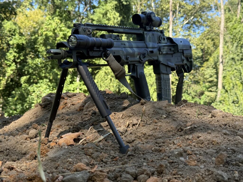 Springfield Hellion on a hill with Blk Lbl Forend bipod deployed