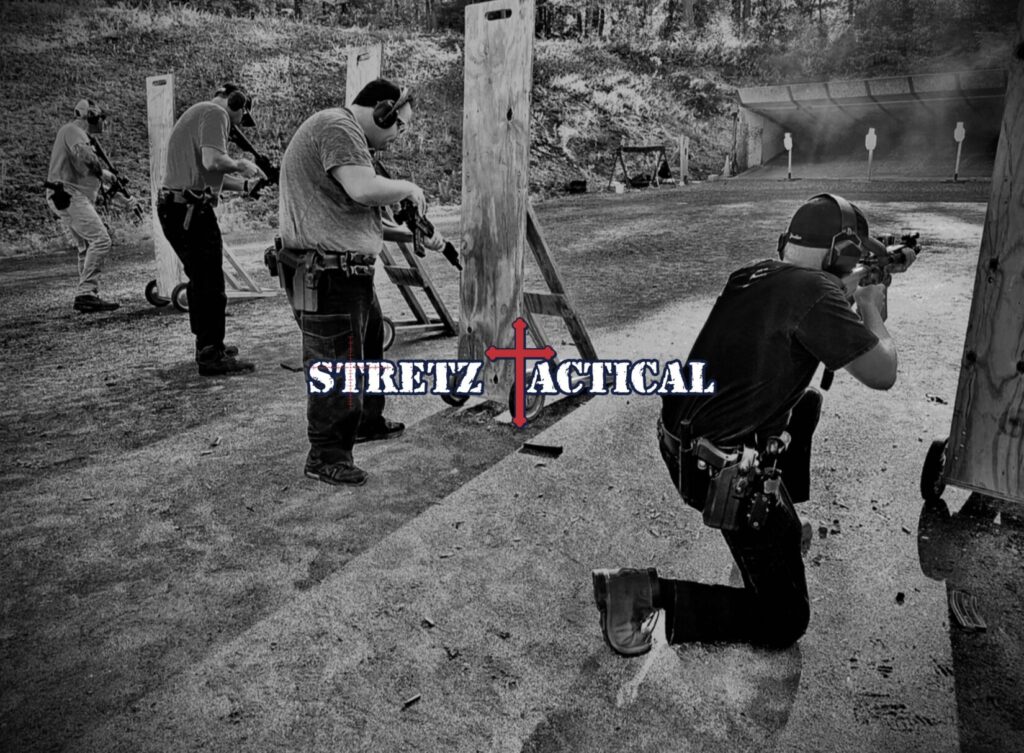 Stretz Tactical students working standing and kneeling barricade positions and malfunctions behind cover