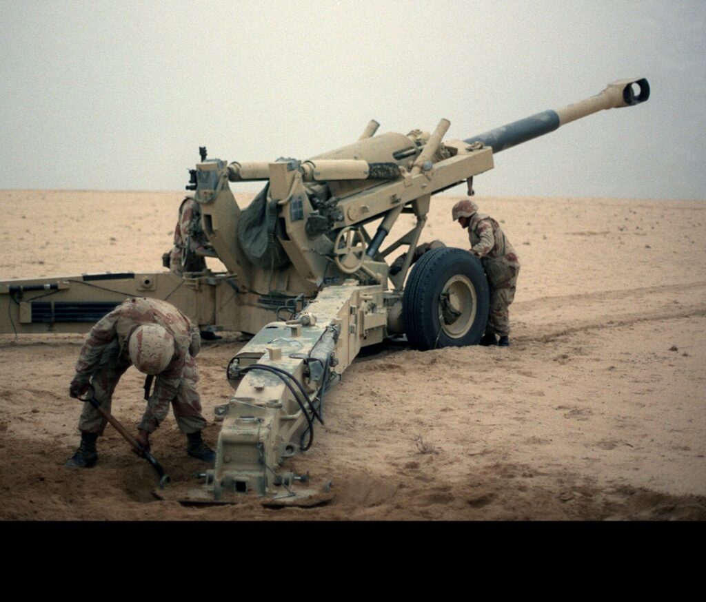 U.S. Marine artillerymen set up their 155 mm M198 howitzer for a fire mission against Iraqi positions on 20 January 1991 during Operation Desert Storm. (U.S. Marine Corps photo by Staff Sgt. Vance. Public Domain)
