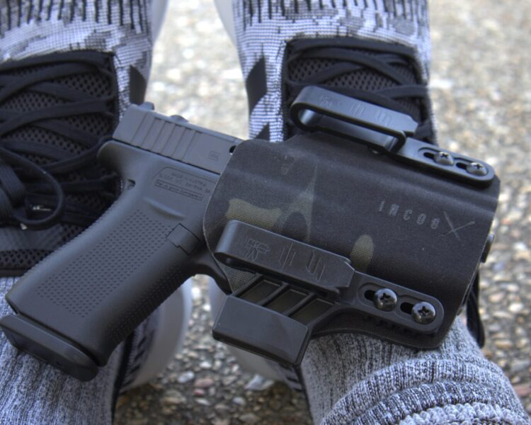 glock 48 in a safariland incogx on running shoes