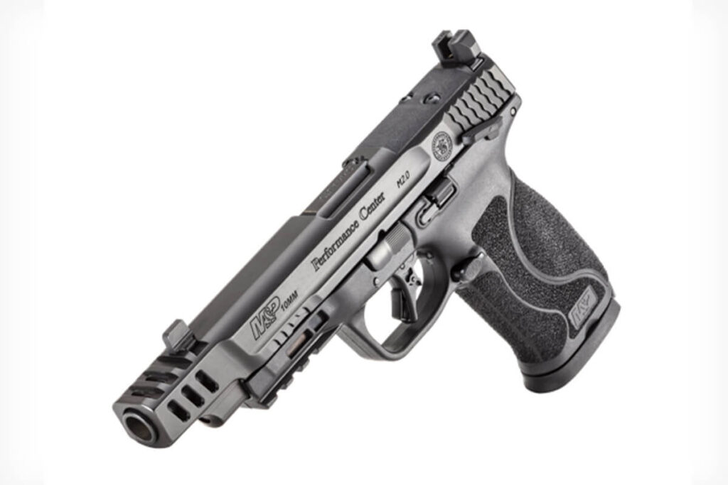 A black M&P Performance Center 10mm M2.0 pistol is shown. It has a ported barrel, optics-ready slide, and textured grip.