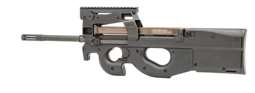 A black FN P90 bullpup submachine gun is shown against a white background. It has a distinctive top-mounted magazine and a compact design.