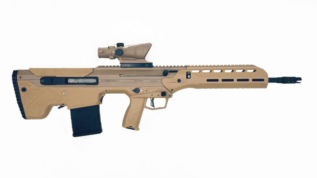 A tan Desert Tech MDRX, a modular bullpup rifle, is shown against a white background. It has a forward ejection system and a scope mounted on top.