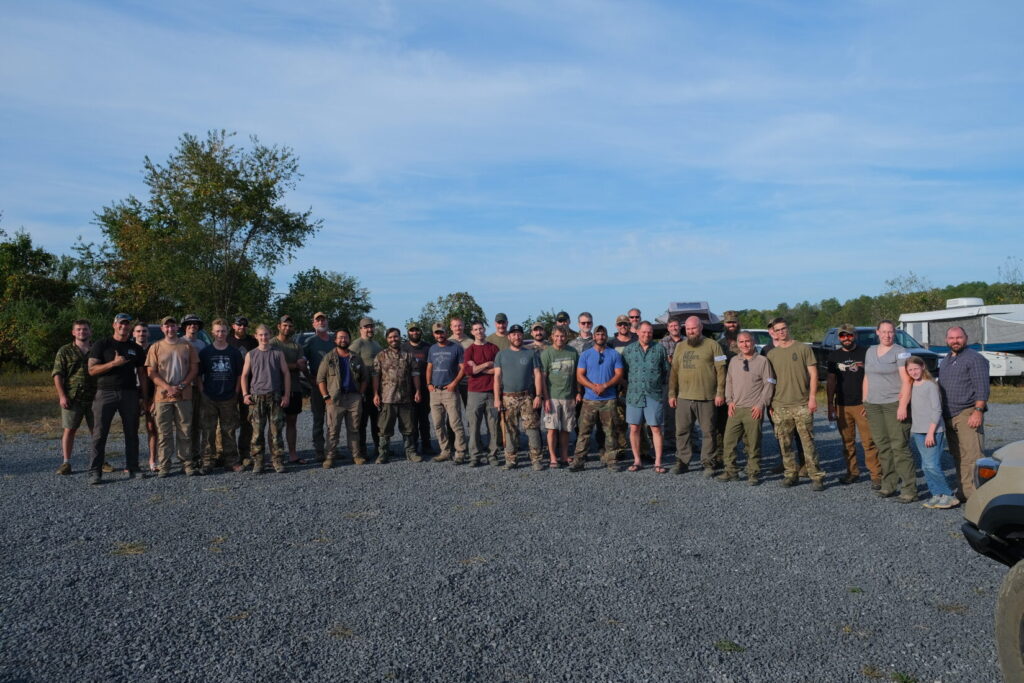 Lineup of competitors and volunteers after completion of the Lightfighter Challenge