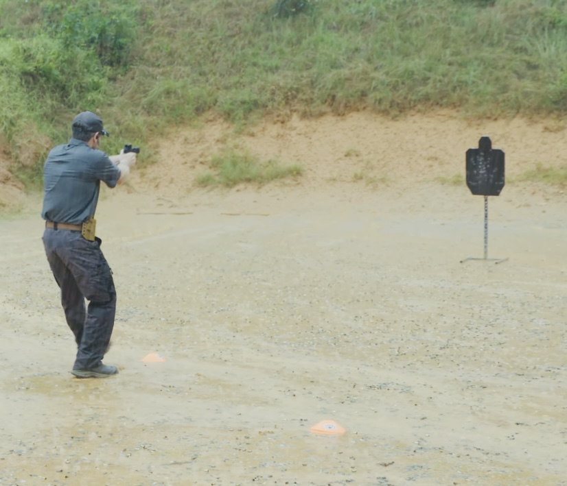 Pictured is rick Hogg founder of War HOGG Tactical demonstrating driving the pistol to the target before both feet are fully planted