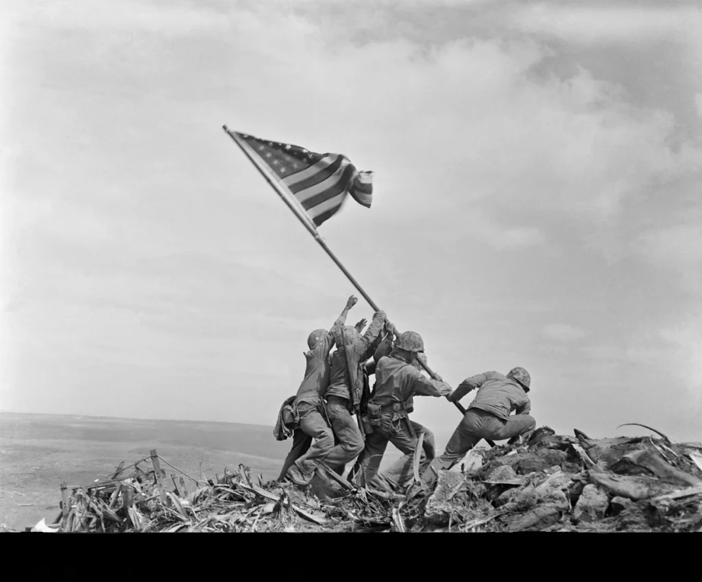Marines raising the American flag on Iwo Jima's Mount Suribachi