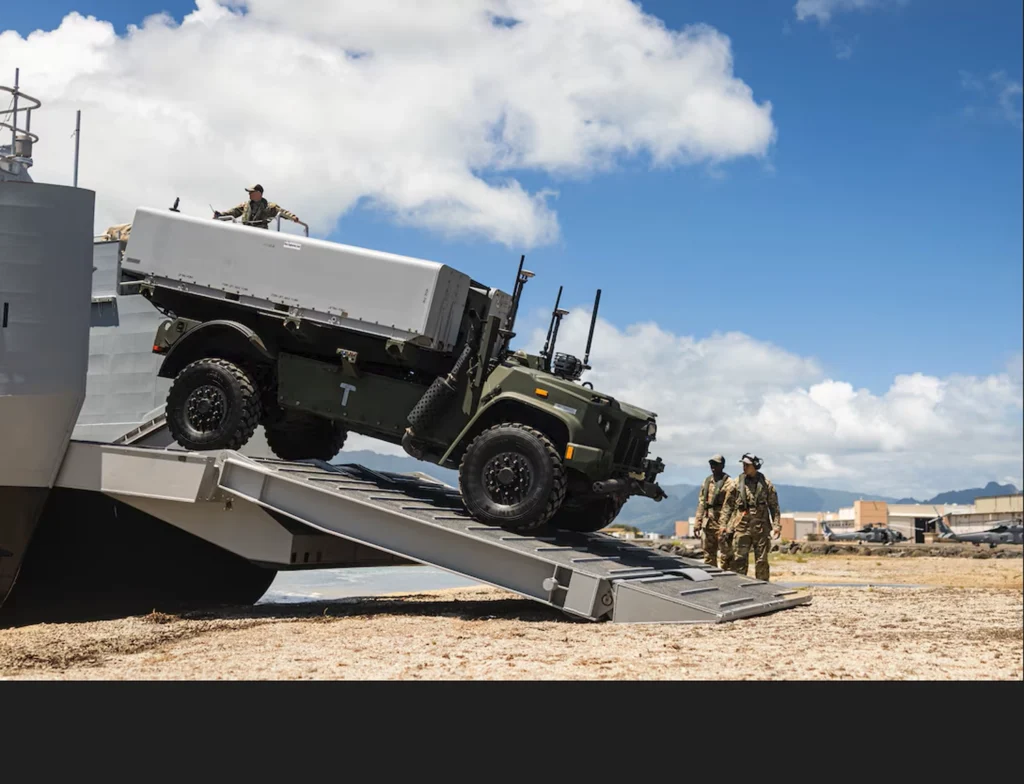 US Army truck unloading from a Navy ship