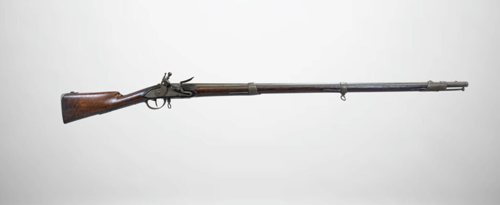 Studio shot of Springfield 1795 Musket, an antique, wooden percussion cap conversion musket