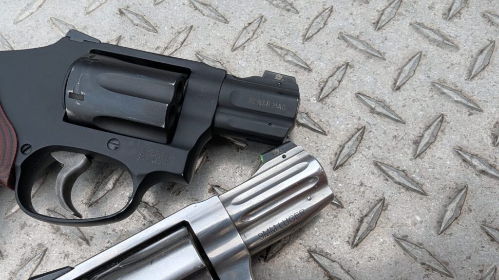 Close-up of the barrels of the S&W 940 (9mm) and S&W 432 UC (.32 H&R Mag) revolvers.