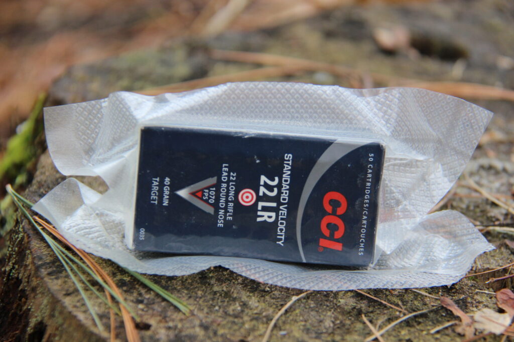 A box of .22 ammunition inside of a vacuum seal bag