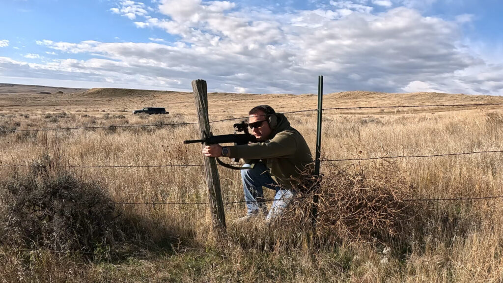 Field shooting in the kneeling with the retro A2 and Brownells optic.