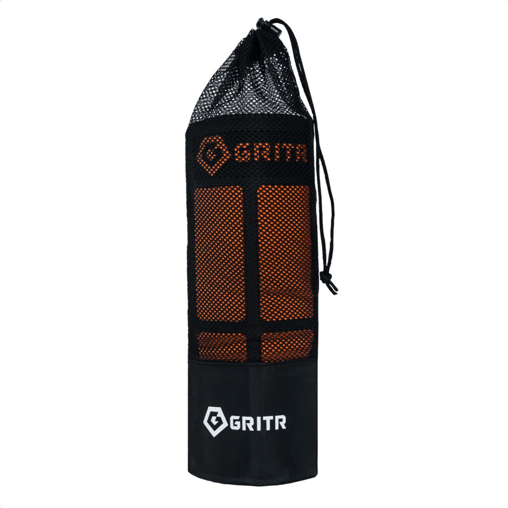 GRITR Magnetic Cleaning Mat in mesh storage bag.