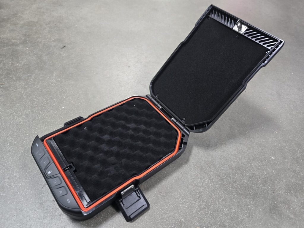 A single locking case for a pistol on a concrete backdrop