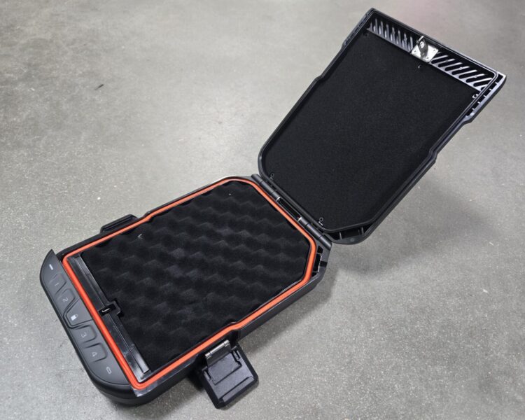 A single locking case for a pistol on a concrete backdrop