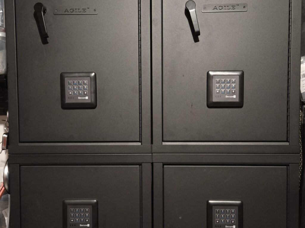 Four firearms safe doors with four digital keypads.