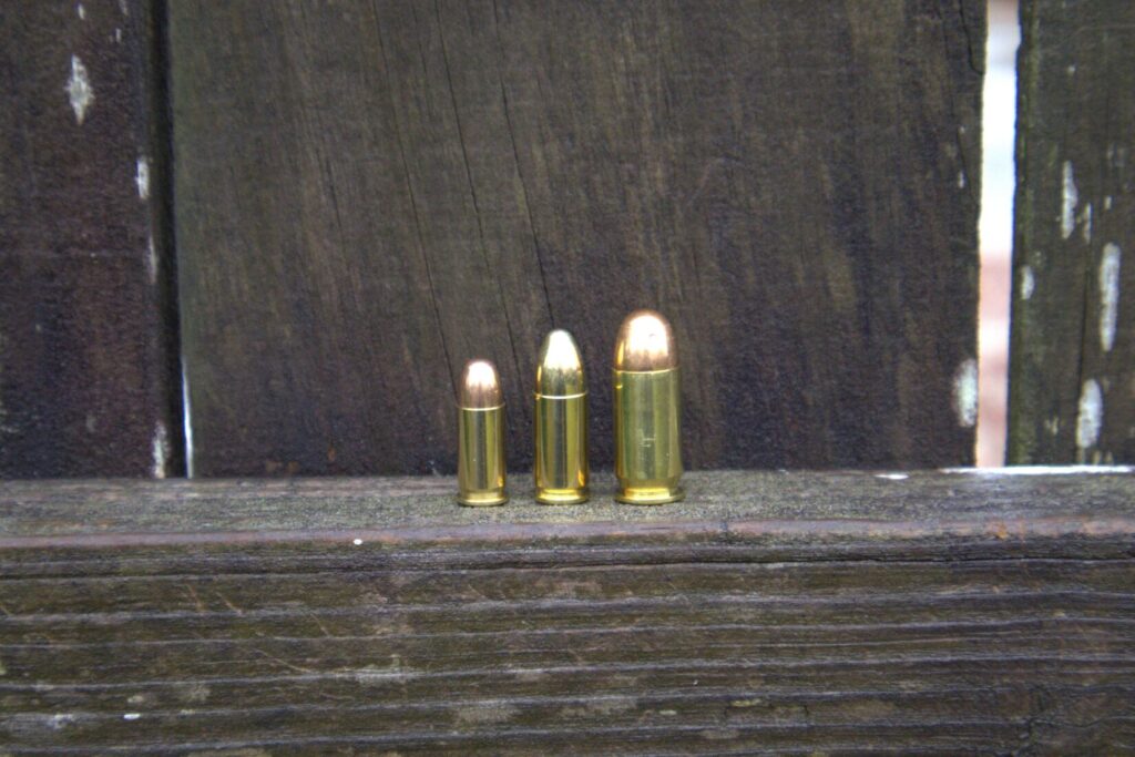 Three cartridge from left to right: 32 acp, 9mm, and .45 acp